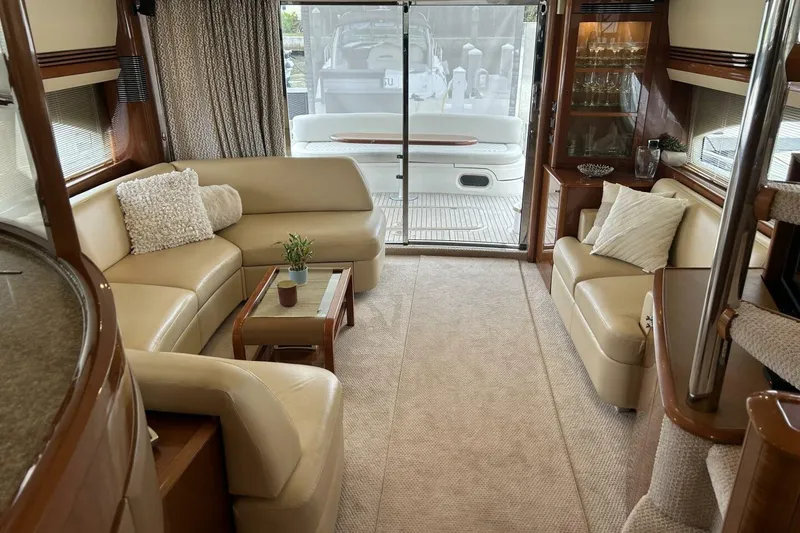 Slide: The Image of Luxurious interior of 2008 Princess 67 Flybridge Motor Yacht with elegant seating and decor. - 22