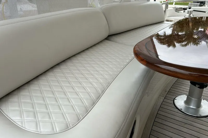 Slide: The Image of Luxurious seating on 2008 Princess 67 Flybridge Motor Yacht with elegant wood table. - 10