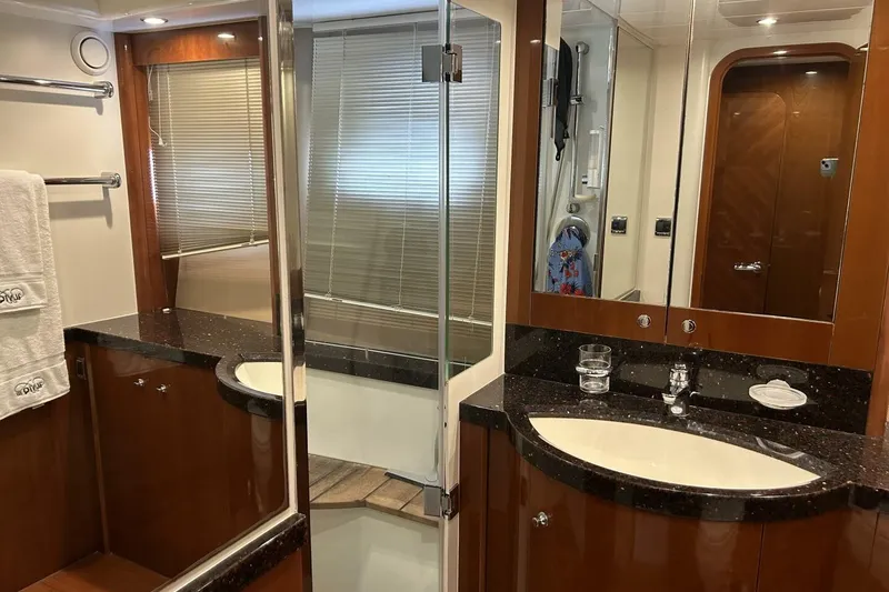 Slide: The Image of Luxurious bathroom in 2008 Princess 67 Flybridge Motor Yacht with elegant fixtures and wood accents. - 29