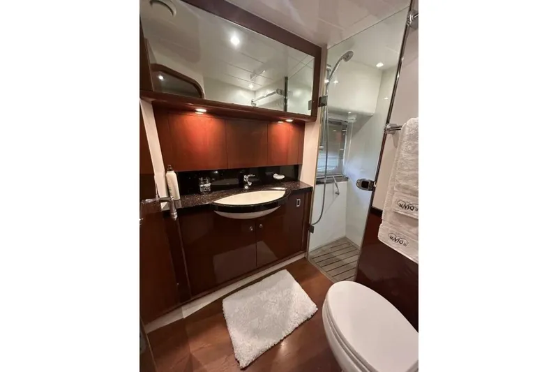 Slide: The Image of Luxurious bathroom in 2008 Princess 67 Flybridge Motor Yacht with elegant wood finishes. - 32