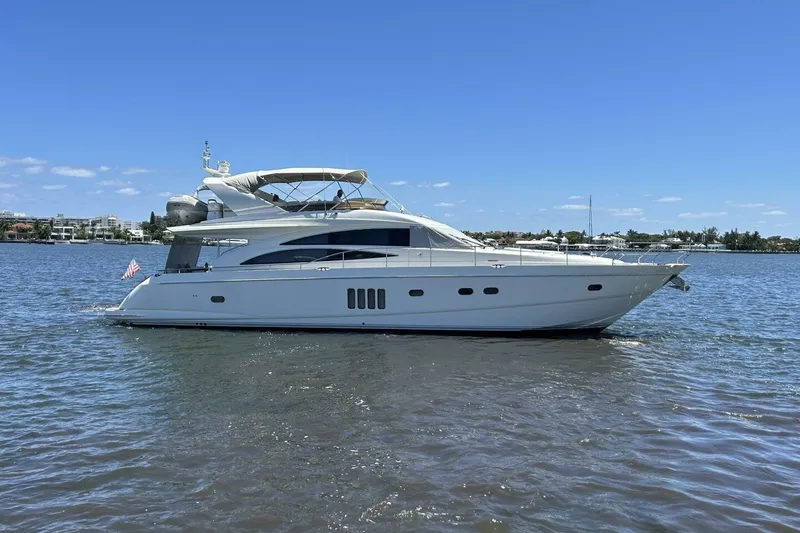 Slide: The Image of 2008 Princess 67 Flybridge Motor Yacht cruising on a sunny day. - 2