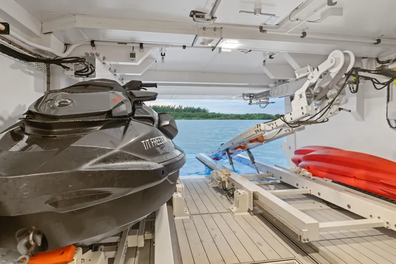 Slide: The Image of Jet ski and kayaks in Azimut Grande 32 Metri yacht garage, 2022 model. - 36