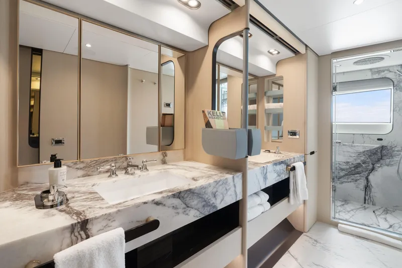 Slide: The Image of Luxurious bathroom in 2022 Azimut Grande 32 Metri yacht with marble countertops and modern fixtures. - 14