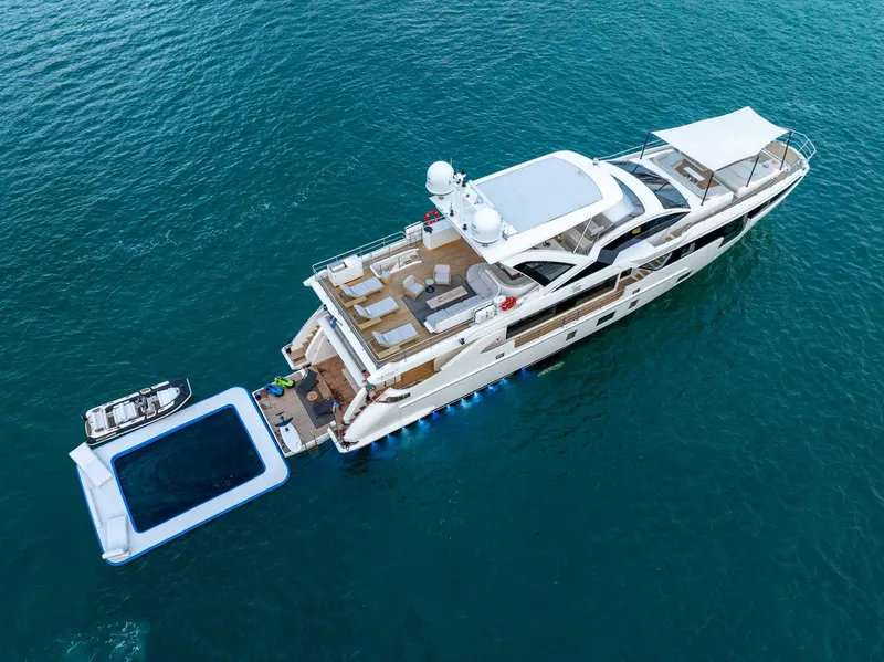 Slide: The Image of Azimut Grande 32 Metri 2022 yacht with floating pool and tender on open sea. - 38