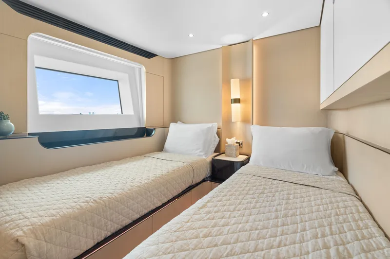 Slide: The Image of Twin bedroom in 2022 Azimut Grande 32 Metri yacht, featuring modern design and ocean view. - 19