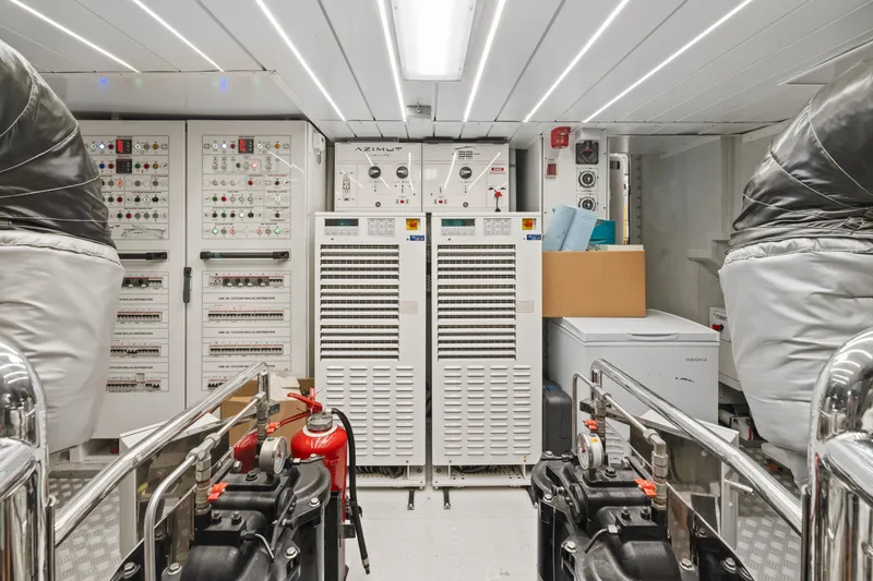 Slide: The Image of Engine room of 2022 Azimut Grande 32 Metri yacht with control panels and equipment. - 35