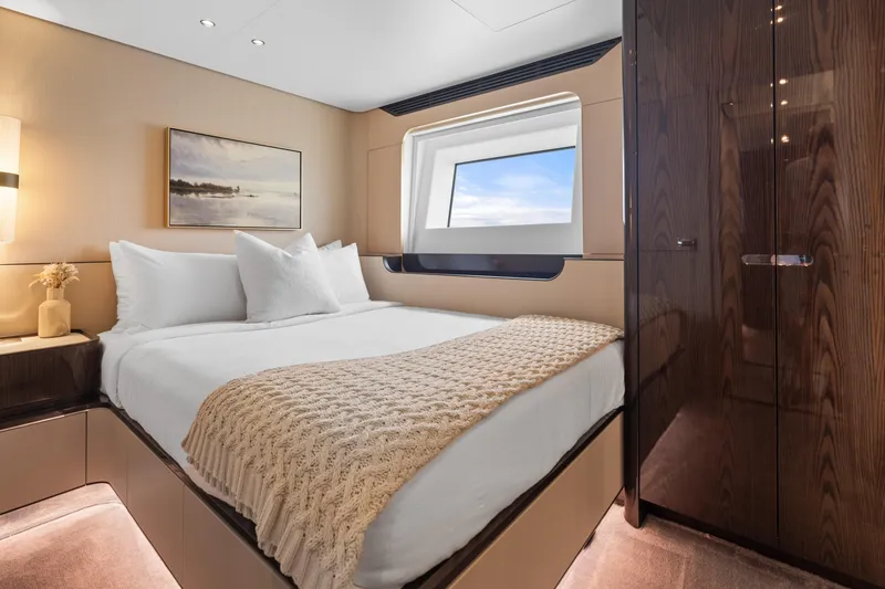 Slide: The Image of Luxurious bedroom interior of 2022 Azimut Grande 32 Metri yacht with elegant decor. - 17