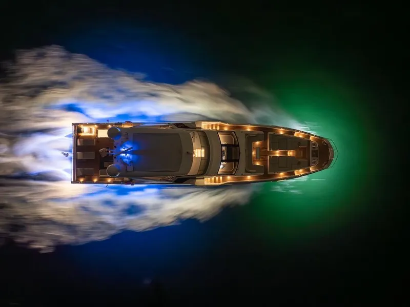 Slide: The Image of Aerial view of 2022 Azimut Grande 32 Metri yacht illuminated at night. - 39