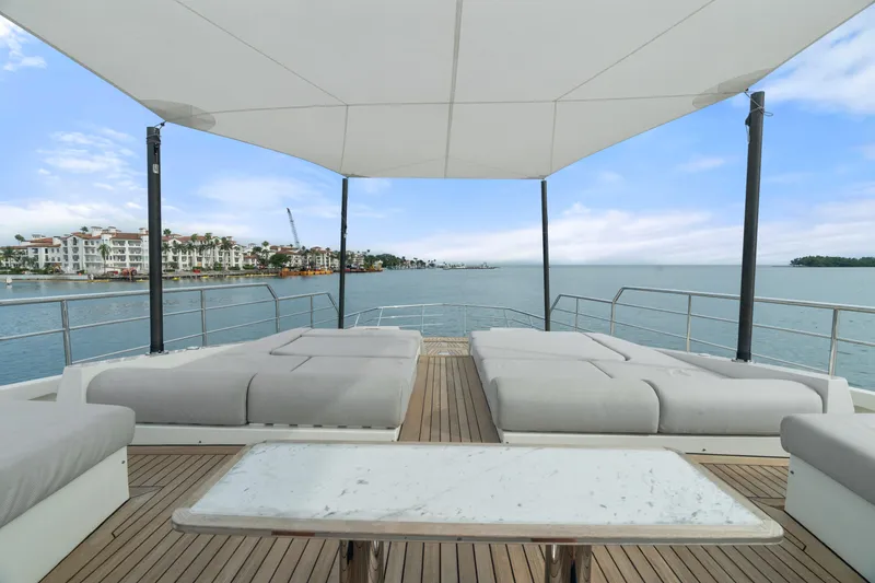 Slide: The Image of Luxurious deck of 2022 Azimut Grande 32 Metri yacht with sunbeds and ocean view. - 24