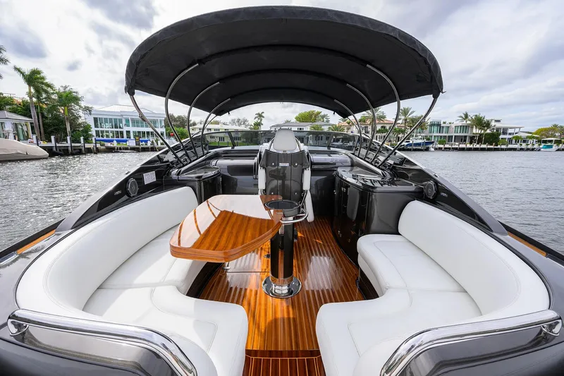 Slide: The Image of Luxurious 2014 Riva 44' Rivarama yacht interior with elegant seating and wooden table. - 46