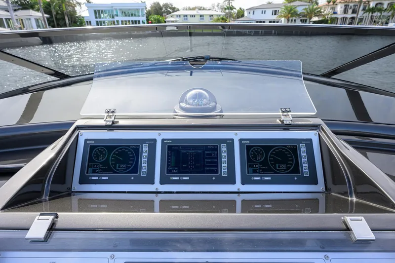 Slide: The Image of Dashboard of 2014 Riva 44' Rivarama yacht with digital displays and controls. - 25