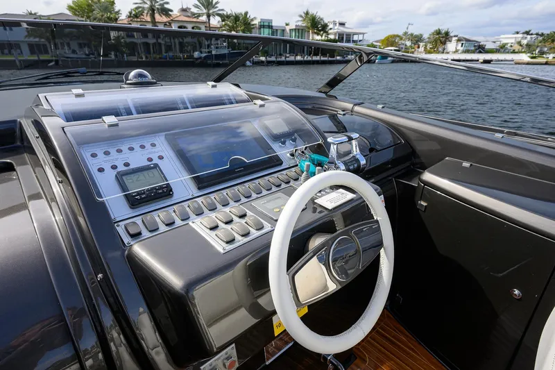 Slide: The Image of Cockpit of 2014 Riva 44' Rivarama yacht with modern controls and steering wheel. - 29