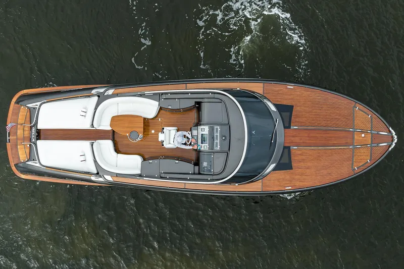 Slide: The Image of Overhead view of 2014 Riva 44' Rivarama luxury yacht on water. - 6