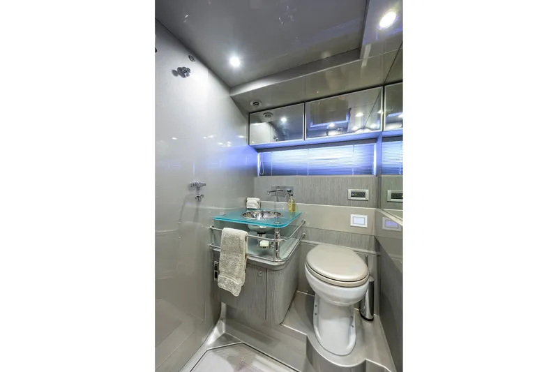 Slide: The Image of Luxurious bathroom interior of 2014 Riva 44' Rivarama yacht, featuring modern fixtures and elegant design. - 38
