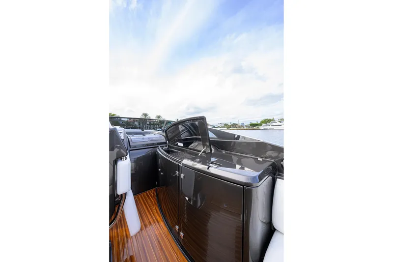 Slide: The Image of 2014 Riva 44' Rivarama yacht interior with sleek design and wooden flooring. - 50