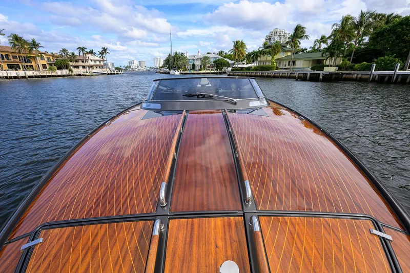 Slide: The Image of Luxurious 2014 Riva 44' Rivarama yacht cruising on a scenic waterway. - 84