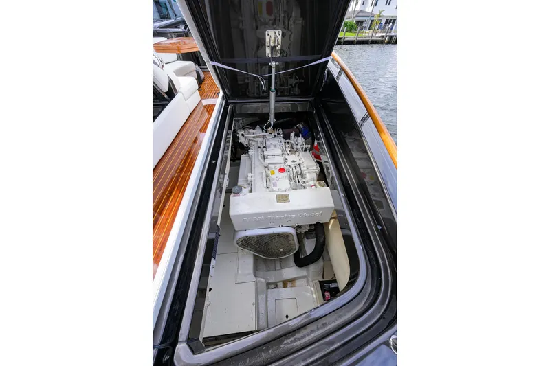 Slide: The Image of Engine compartment of 2014 Riva 44' Rivarama luxury yacht, showcasing detailed mechanics. - 94
