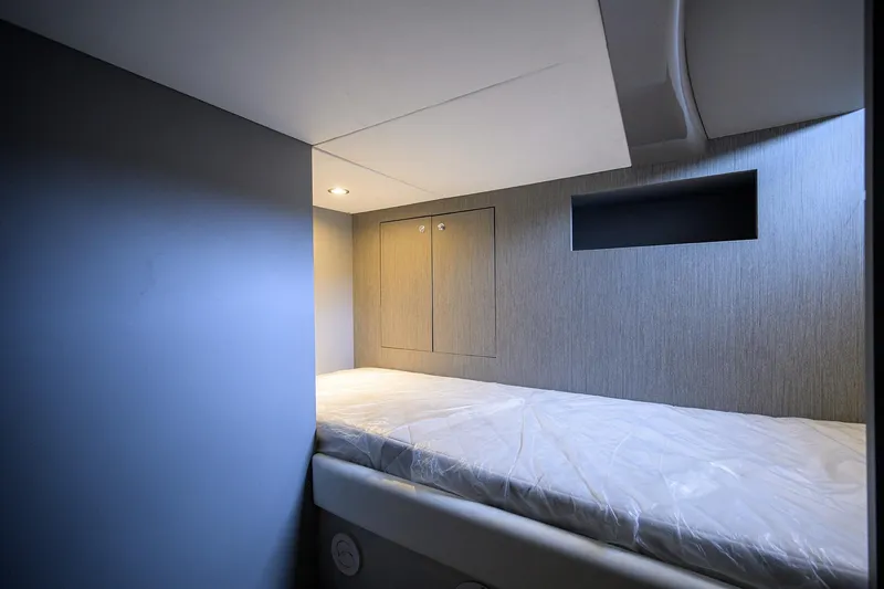Slide: The Image of Interior cabin of 2014 Riva 44' Rivarama yacht, featuring a sleek, modern design. - 44