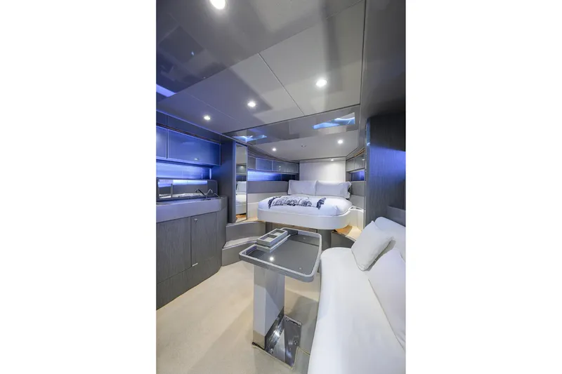 Slide: The Image of Luxurious interior of 2014 Riva 44' Rivarama yacht with modern furnishings and ambient lighting. - 68