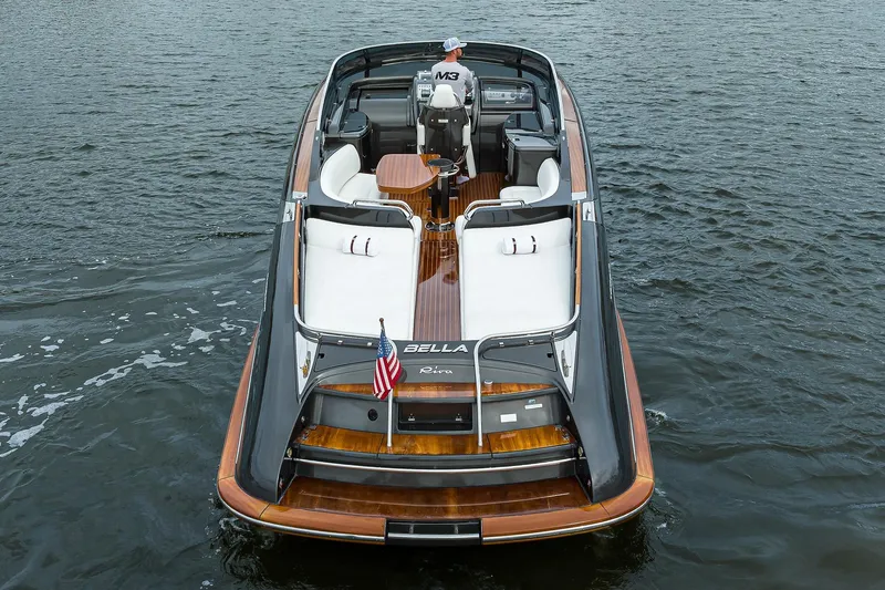 Slide: The Image of Luxury 2014 Riva 44' Rivarama yacht cruising on open water. - 9