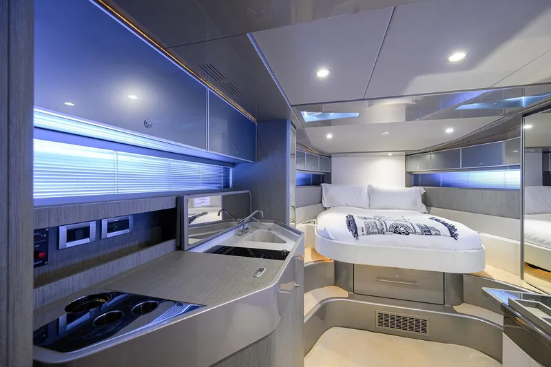 Slide: The Image of Luxurious interior of 2014 Riva 44' Rivarama yacht with modern bedroom and kitchenette. - 74