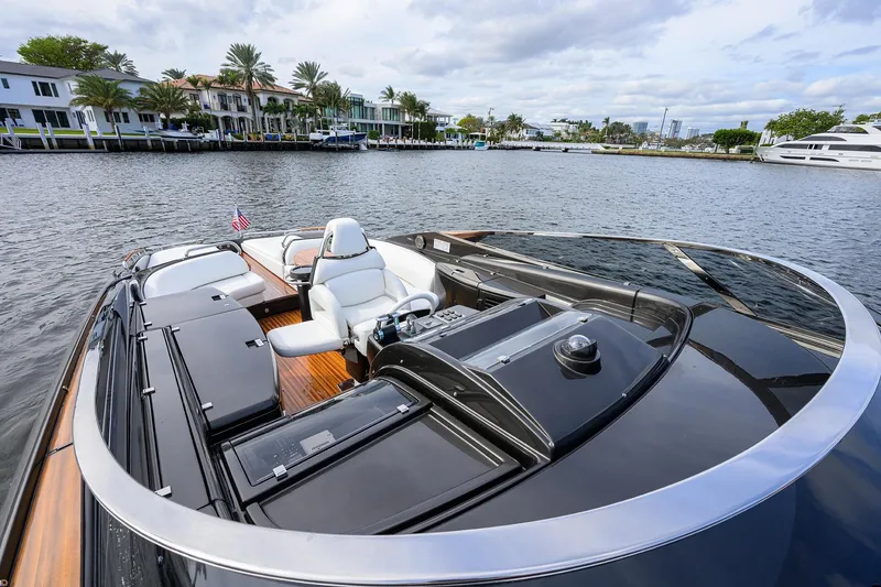 Slide: The Image of Luxurious 2014 Riva 44' Rivarama yacht on a scenic waterfront. - 19