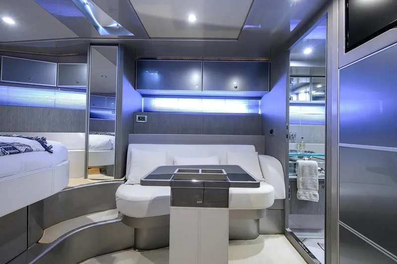 Slide: The Image of Luxurious interior of 2014 Riva 44' Rivarama yacht with modern seating and ambient lighting. - 71