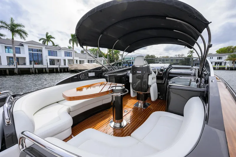 Slide: The Image of Luxurious 2014 Riva 44' Rivarama yacht interior with elegant seating and sleek design. - 45