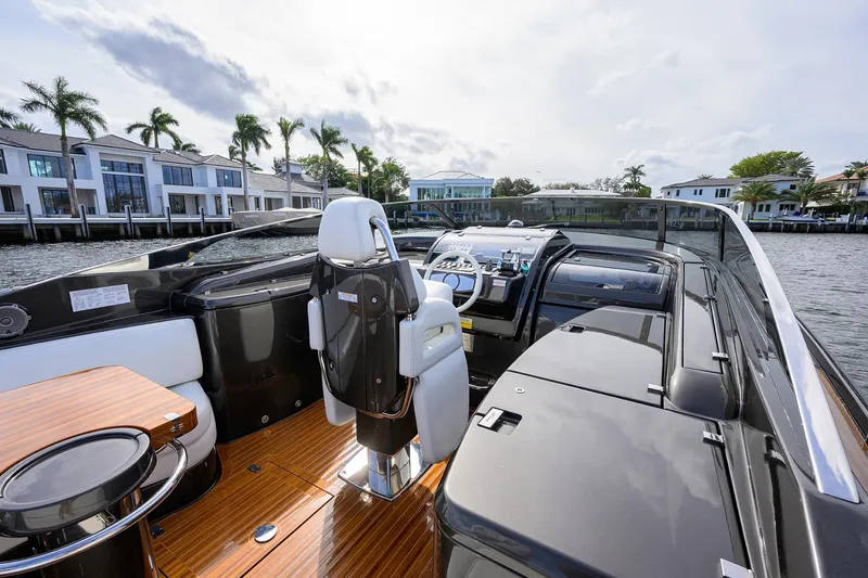 Slide: The Image of Luxurious 2014 Riva 44' Rivarama yacht interior with sleek design and waterfront view. - 33