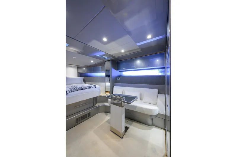 Slide: The Image of Luxurious interior of 2014 Riva 44' Rivarama yacht with modern seating and ambient lighting. - 73