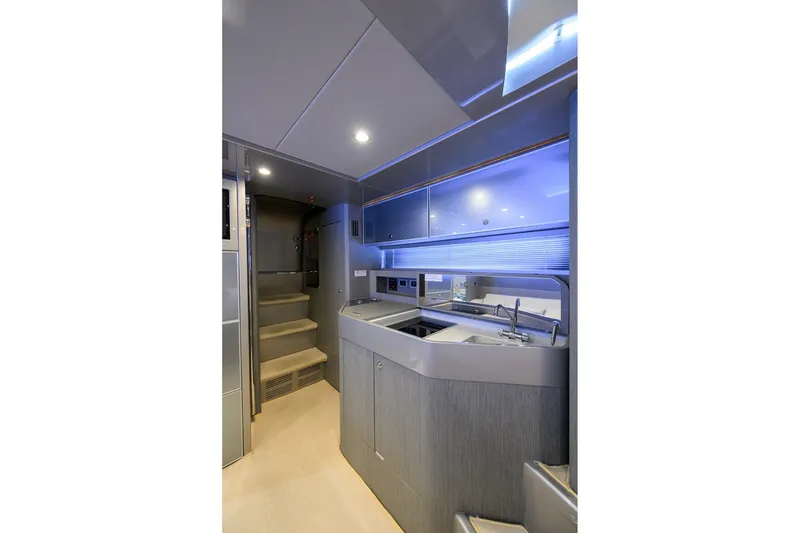Slide: The Image of Luxurious interior of 2014 Riva 44' Rivarama yacht with modern kitchen and sleek design. - 77