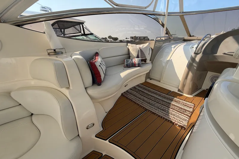 Slide: The Image of Luxurious interior of 2003 Cruisers Yachts 5470 Express with plush seating and elegant decor. - 15