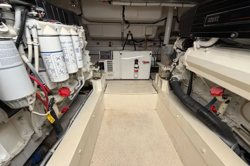 Slide: The Image of Engine room of 2003 Cruisers Yachts 5470 Express with Volvo Penta components. - 39