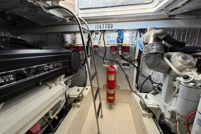 Slide: The Image of Engine room of 2003 Cruisers Yachts 5470 Express with Volvo Penta D12-715 engine. - 38
