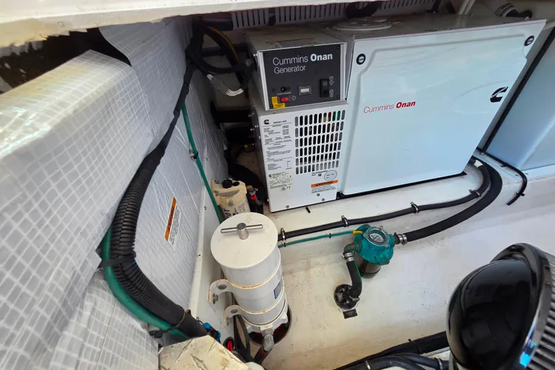 Slide: The Image of Engine room of 2018 Back Cove 37 with Cummins Onan generator. - 86