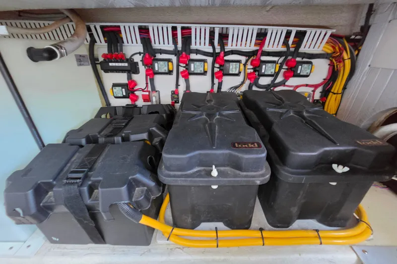 Slide: The Image of Electrical system of a 2018 Back Cove 37 boat with battery boxes and wiring. - 90