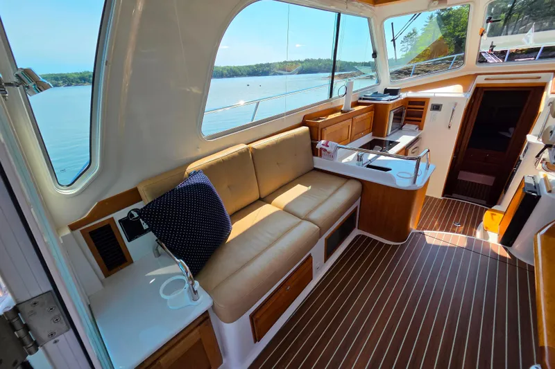 Slide: The Image of Luxurious interior of 2018 Back Cove 37 yacht with elegant seating and scenic views. - 81