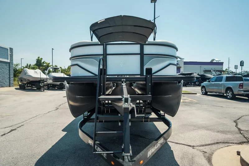 Slide: The Image of 2022 Cypress Cay Seabreeze 252 pontoon boat on trailer in parking lot. - 6