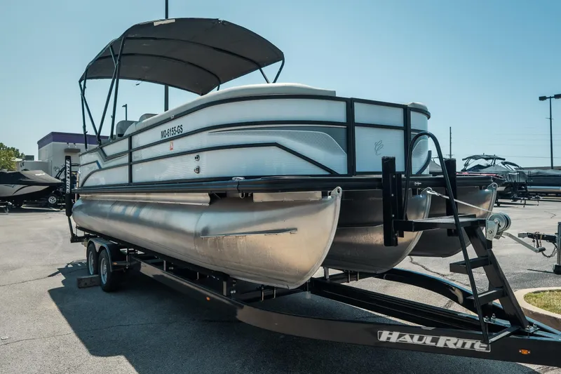 Slide: The Image of 2022 Cypress Cay Seabreeze 252 pontoon boat on trailer in parking lot. - 5