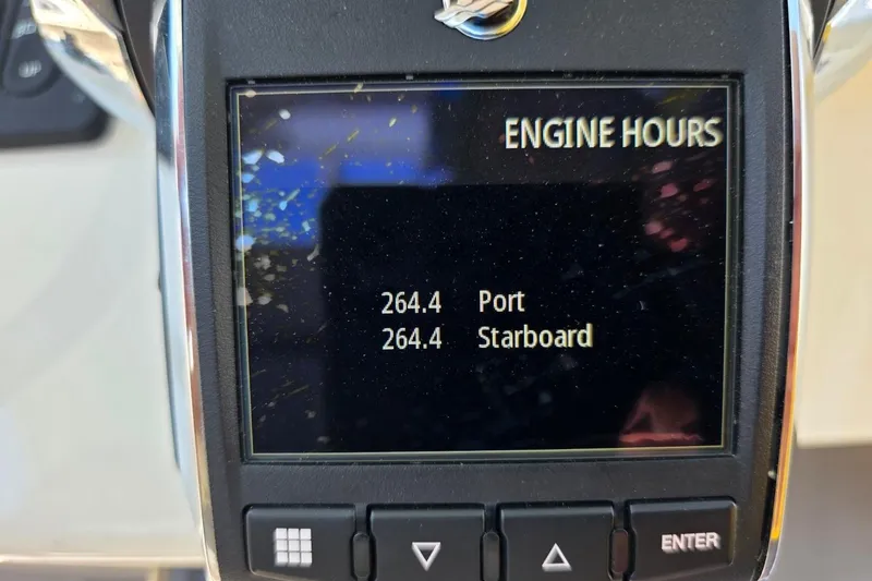 Slide: The Image of Display showing engine hours for Solace 32CS, 2023 model: 264.4 hours port and starboard. - 20