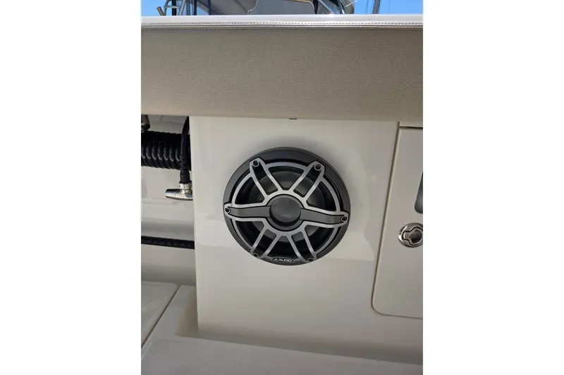 Slide: The Image of 2023 Solace 32CS boat speaker detail with sleek design and modern finish. - 10