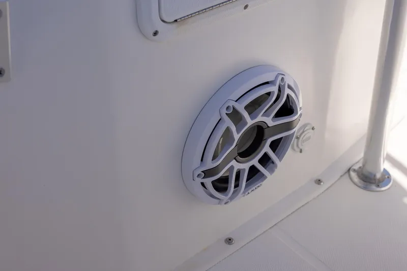 Slide: The Image of Speaker on 2006 Bluewater 2150 CC boat, mounted on white panel. - 23