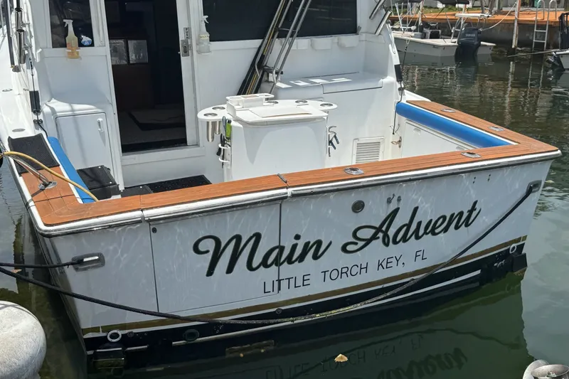 Slide: The Image of 1991 Ocean Yachts 35 Super Sport docked, named "Main Advent," Little Torch Key, FL. - 8