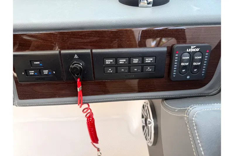 Slide: The Image of Control panel of 2023 Chaparral 280 OSX boat with Yamaha and Lenco systems. - 63