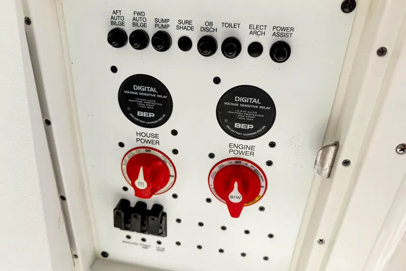 Slide: The Image of Control panel of 2023 Chaparral 280 OSX boat with power switches and digital relays. - 18
