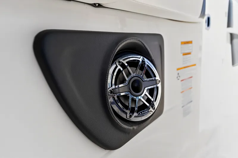 Slide: The Image of Speaker detail on 2023 Chaparral 280 OSX boat, featuring JL Audio system. - 68