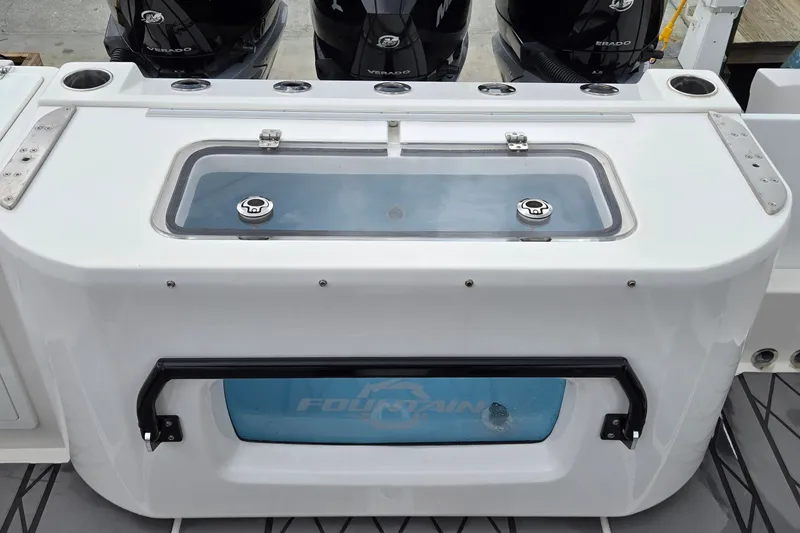 Slide: The Image of 2024 Fountain 32 NX Sportfish boat with livewell and Mercury Verado engines. - 16