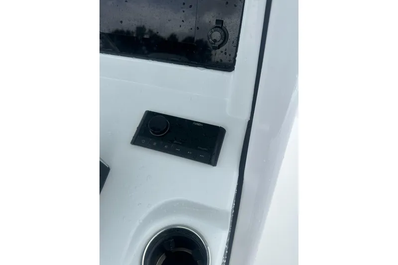 Slide: The Image of Control panel of 2026 Sportsman Open 232 Center Console boat, featuring a sleek design. - 14