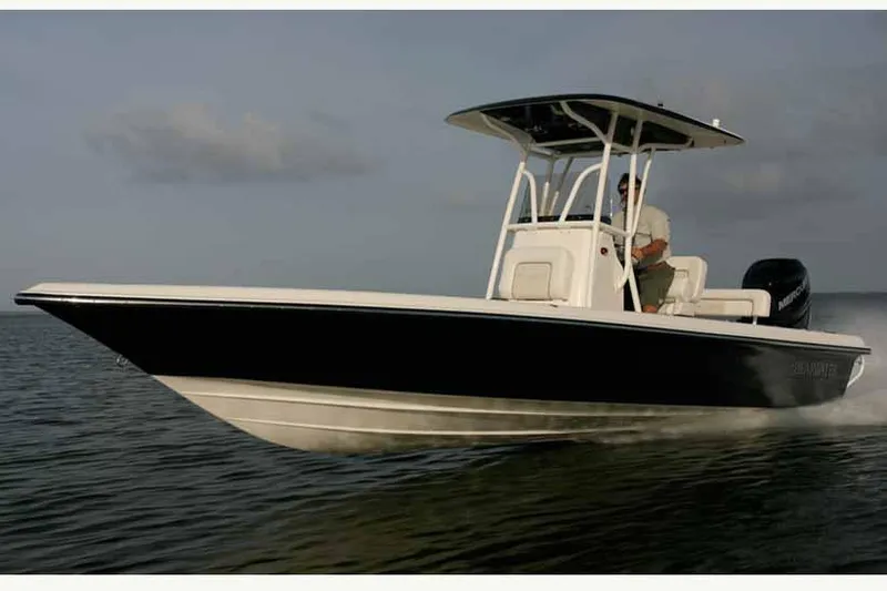 Slide: The Image of Manufacturer Provided Image: 2018 ShearWater 25 LTZ boat cruising on water. - 44