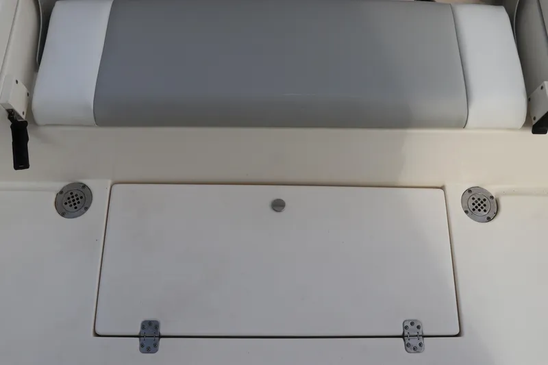 Slide: The Image of 2018 ShearWater 25 LTZ boat seating and storage compartment. - 14